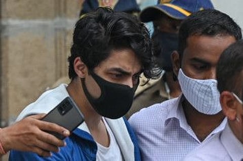 Aryan Khan is escorted to court by NCB officials for a bail plea hearing in Mumbai on October 8