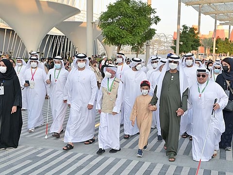 Top officials, ministers, people of determination and Expo visitors participated in the 'White Cane March' on Friday
