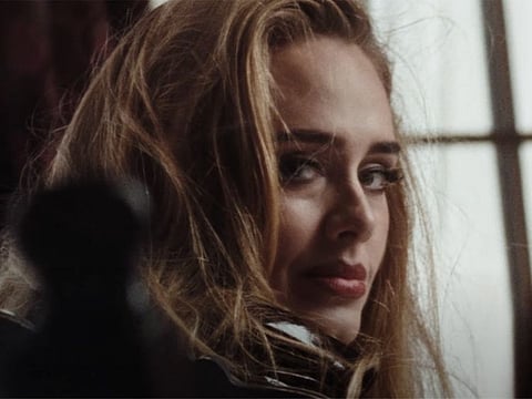 Adele in the music video for 'Easy On Me'.