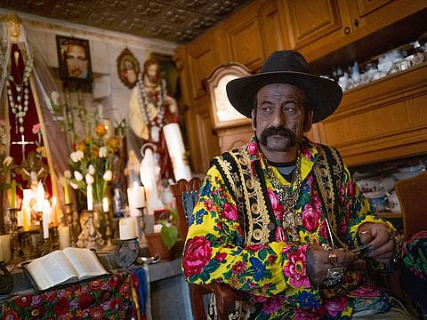 Zoltan Sztojka, traditional Gypsy fortune-teller is seen in his home in Soltvadkert, central Hungary.