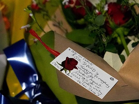 A note of condolence is placed by the side of one of the roads leading to the Belfairs Methodist Church in Eastwood Road North, where British Conservative lawmaker David Amess has died after being stabbed.