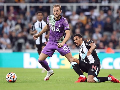 Tottenham Hotspur's Harry Kane in action with Newcastle United's Isaac Hayden.
