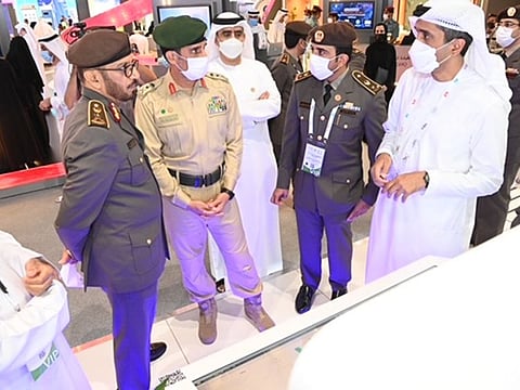 Lieutenant General Mohammad Al Marri, director-general of GDRFA-Dubai (left), with Lietenant General Abdullah Khalifa Al Merri (second from left), Commander-In-Chief of Dubai Police, at the GDRFA-Dubai platform at GITEX at Dubai World Trade Centre on Sunday