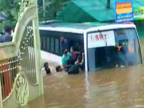 A Kerala State Road Transport Corporation bus caught in the flood waters near in Poonjar, Kottayam district, Kerala.