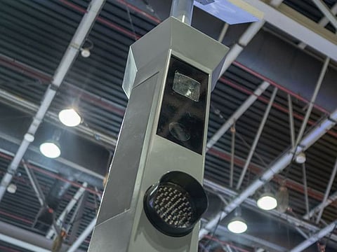 A smart camera for monitoring pedestrian crossings at the Dubai Police stand at GITEX Technology Week 2021 at Dubai World Trade Centre