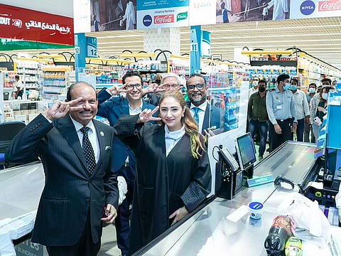 During the launch of the campaign. (L to R, front) Lulu group chairman Yusuff Ali M.A and Tala Al Ramahi from the Abu Dhabi Crown Prince Court and managing director for Reach Campaign, at LuLu Hypermarket in Mushrif Mall in Abu Dhabi