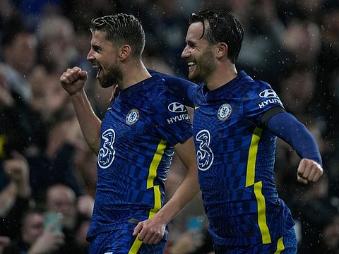 Chelsea's Jorginho celebrates with Ben Chilwell, right, after scoring his side's fourth goal.
