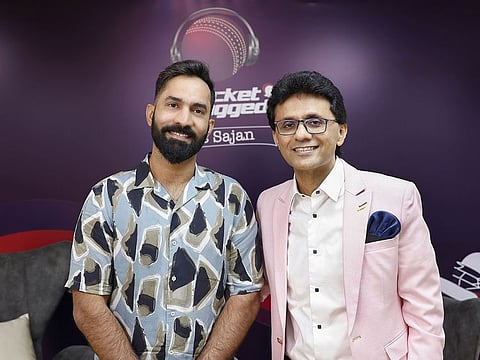 Dinesh Karthik (left) with Anis Sajan during his visit to the Danube headquarters in Dubai.