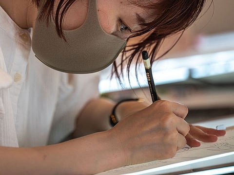 A student drawing at the anime school Sasayuri in Tokyo.
