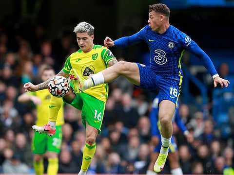 Chelsea's Ross Barkle (right) battles for the ball with Norwich City's Mathias Normann at Stamford Bridge Stadium in London.
