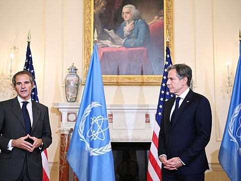 US Secretary of State Antony Blinken (right) listens to International Atomic Energy Agency Director General Rafael Mariano Grossi speak in Washington on October 18, 2021. Grossi expressed concern on Tuesday he was still waiting for a "high level" discussion with Iranian officials in Tehran, after negotiating last month a new compromise on monitoring Iran's nuclear programme to help restart the talks in Vienna.