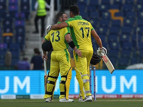 Marcus Stoinis (right) and teammate Matthew Wade shared an unbroken 40 as Australia beat South Africa by five wickets with two balls to spare.