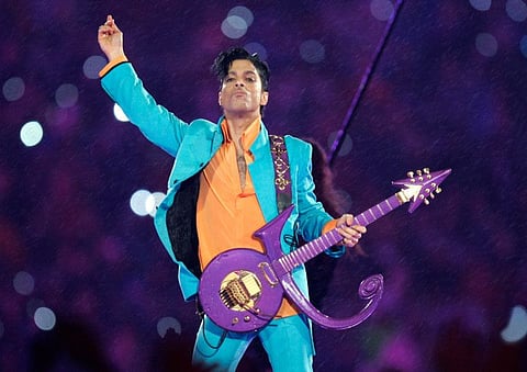 In this Feb. 4, 2007, file photo, Prince performs during the halftime show at the Super Bowl XLI football game in Miami.