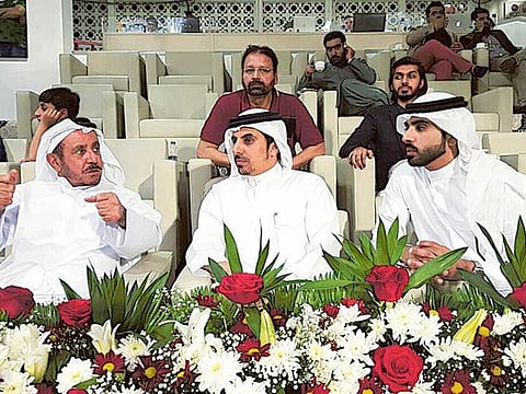 A rich legacy: Abdul Rahman Bukhatir (left) with his two sons, Waleed and Khalaf, at the Sharjah Cricket Stadium.