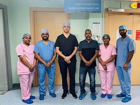 Dr Sanjay Rajdev and the medical team with patient Abdul Samad Mohammad Shaliheen.