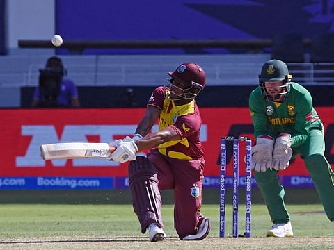 Evin Lewis of West Indies plays a shot during the ICC Men's T20 World Cup cricket match against South Africa at the Dubai International Stadium on October 26, 2021.