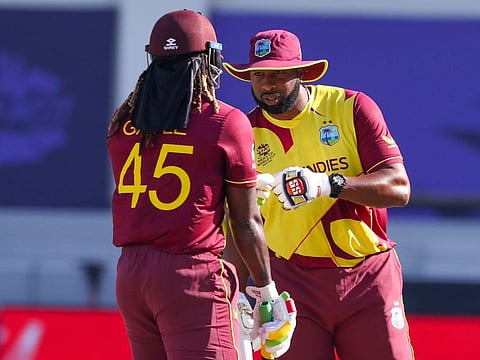West Indies captain Kieron Pollard (right) has failed to get star teammates like Chris Gayle firing for them during their Twenty20 World Cup campaign so far.