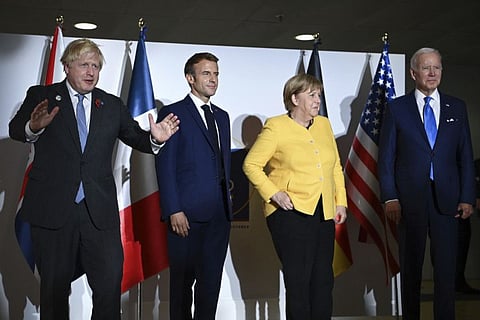 From left: Prime Minister Boris Johnson, French President Emmanuel Macron, German Chancellor Angela Merkel and US President Joe Biden during the G20 summit in Rome on October 30, 2021.