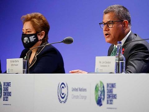 President for COP26, Alok Sharma and Executive Secretary of the United Nations Framework Convention on Climate Change, Patricia Espinosa hold a press conference during the UN Climate Change Conference (COP26) in Glasgow, Scotland, Britain October 31, 2021.