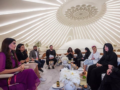 Shaikha Latifa bint Mohammed bin Rashid Al Maktoum (extreme right) meeting media representatives at UAE Pavilion at Expo 2020 Dubai