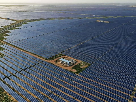 This photo taken on October 6, 2021 shows solar panels at the site of solar energy projects developer Saurya Urja Company of Rajasthan Limited, at the Bhadla Solar Park, in the northern Indian state of Rajasthan.