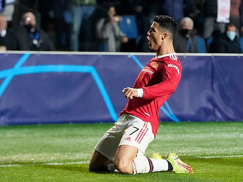 Manchester United's Cristiano Ronaldo celebrates after scoring the late equaliser against Atalanta..