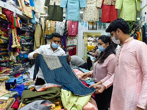Buying new clothes is a tradition that Indian expats follow during Diwali.