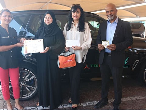 Indian expatriate Swapna Thomas with the certificate.