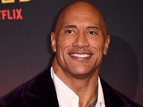 US actor Dwayne Johnson attends the world premiere of Netflix's "Red Notice" at LA Live in Los Angeles on November 3, 2021.