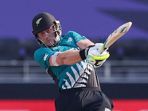 New Zealand's Martin Guptill hits a six during the ICC Men's Twenty20 World Cup match against Scotland in Dubai on November 3, 2021.