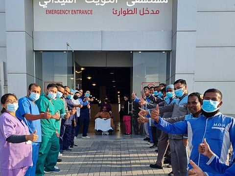 Hospital staff sends off last COVID-19 patient