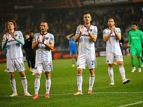 West Ham players celebrate.