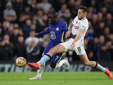 Chelsea's N'Golo Kante in action with Burnley's Josh Brownhill.