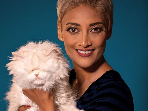 Dr Emily Shotter with her blind cat Moet. The moetblindcat Instagram account has 72,000 followers.