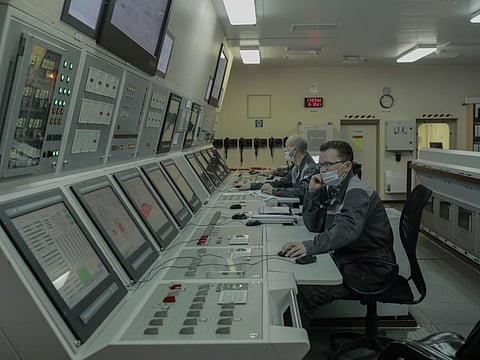 Operators on a floating nuclear power plant docked in the Arctic port town of Pevek, Russia, Oct. 6, 2021. A remote Siberian town now has its own miniature nuclear plant as a Russian state company tests a new model for residential heating. Some see it as a tool to minimize climate change.