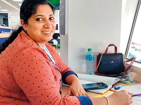 Blessy Rivin keeps the score during New Zealand's game against Afghanistan in the ICC Men's T20 World Cup in Abu Dhabi on November 7, 2021.