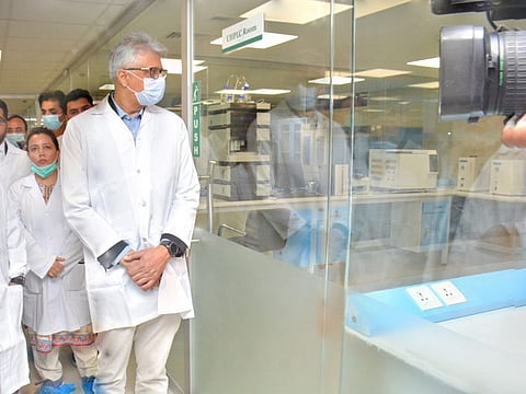 Dr Faisal Sultan inspects the upgraded drug testing laboratory in Karachi.