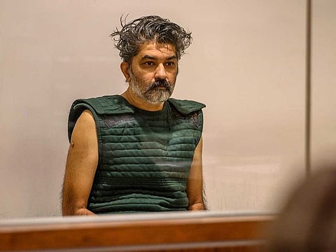 In this Oct. 16, 2019, file photo, Shankar Hangud, wearing a personal safety vest, appears in the Placer County Superior Court in Roseville, Calif. Hangud, 55, who confessed to killing his wife and three sons in 2019, was sentenced Wednesday, Nov. 10, 2021, to life in prison without parole.