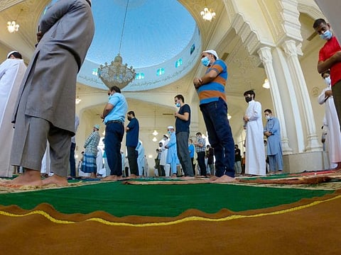 Worshippers perform special prayers for rain at Abu Bakr AlSiddiq Mosque in Sharjah today.