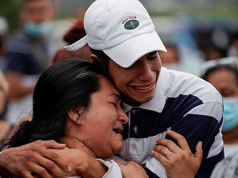 People react outside the judicial police station after prisoners were killed and injured in overnight violence at Penitenciaria del Litoral prison, in Guayaquil, Ecuador November 13, 2021.