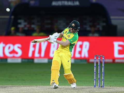 Australia's David Warner, who became the Man of the Tournament, in full flow against New Zealand in the final of the T20 World Cup at the Dubai International Stadium.