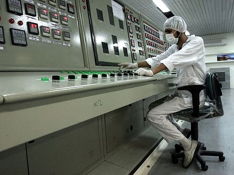 An Iranian technician works at the Uranium Conversion Facility just outside the city of Isfahan in a file photo.