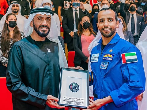 Sheikh Nahyan bin Zayed Al Nahyan Chairman of Abu Dhabi Sports Council with UAE astronaut Hazza Al Mansouri - the first Emirati to go to space - at a packed Jiu Jitsu Arena at Zayed Sport City.