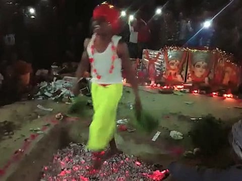 Mahato walking on fire to prove that he is serious about his promises made to voters.