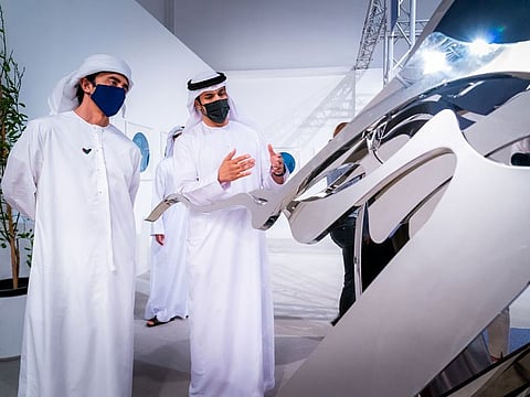 Sheikh Abdullah bin Zayed Al Nahyan (left) during his visit to Art Abu Dhabi on Saturday