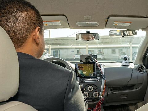 Smart cameras in many places inside and outside the driving test vehicle help analyze examinees' driving skills