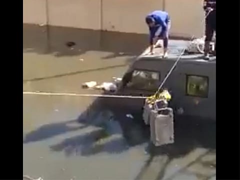 A video showing a number of Egyptian security guards recovering several money boxes from the broken-down vehicle has gone viral on social media.