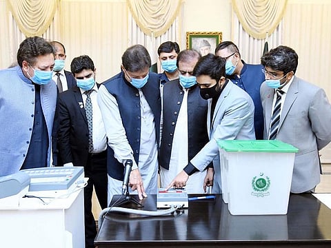 Pakistan Prime Minister Imran Khan at the demonstration of Electronic Voting Machine developed by the Ministry of Science and Technology in a file photo.