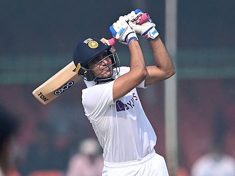 Indian opener Shubman Gill plays a lofted drive during his half-century in the first Test at Kanpur on Thursday.