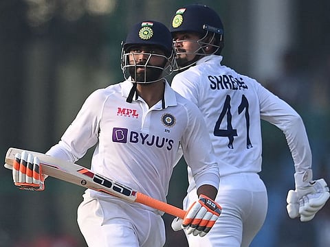 Test debutant Shreyas Iyer (right) and Ravindra Jadeja during their unbeaten 113-run stand for fifth wicket in Kanpur on Thursday.